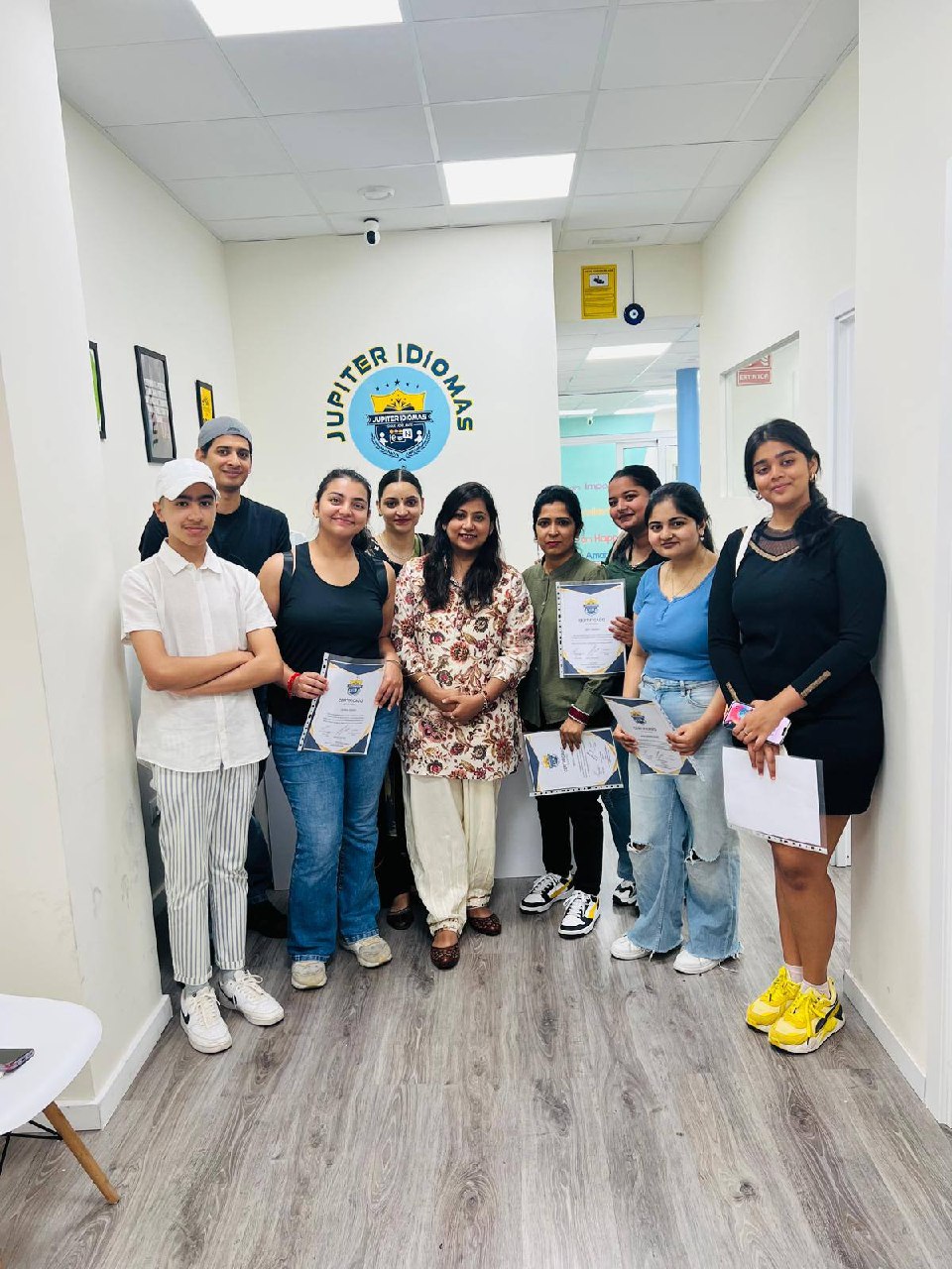 Jupiter Idiomas students celebrating together with their Spanish certificates